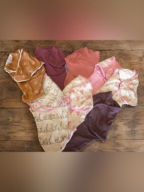 Eight baby swaddles. Washed but never worn.